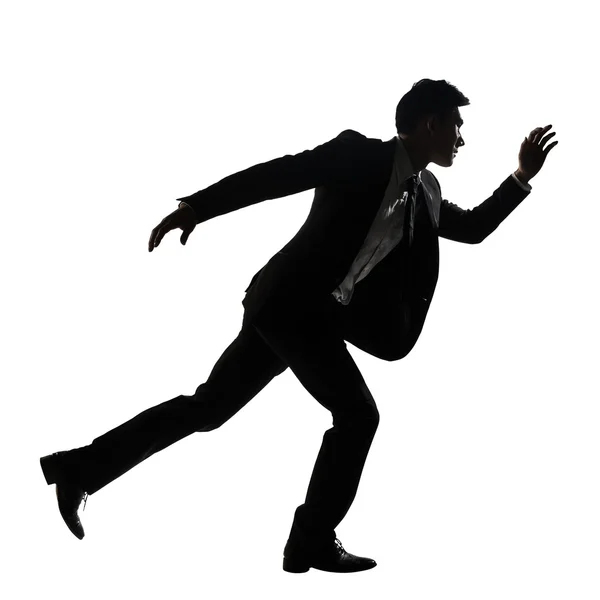 Silueta de asiático hombre de negocios corriendo — Foto de Stock