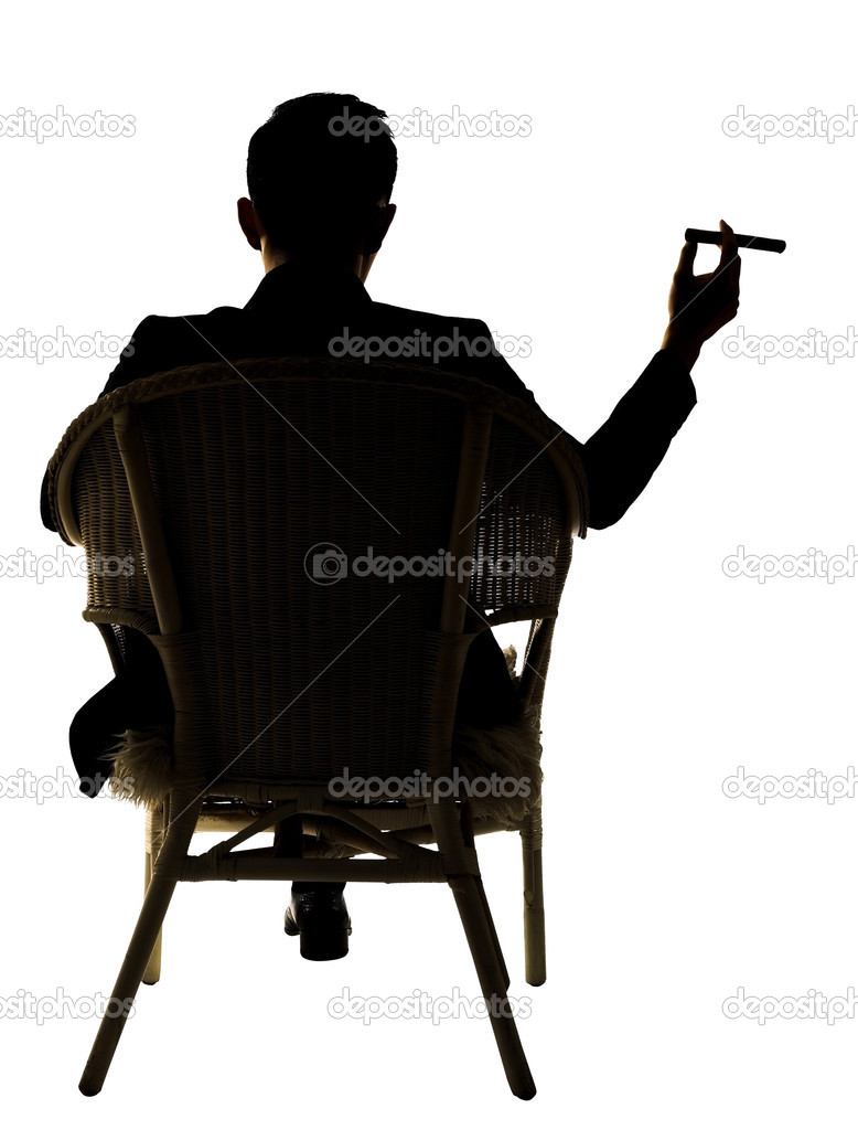 Silhouette of businessman sit 