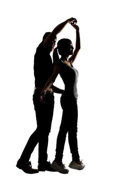 Силуэт азиатской пары, танцующей — стоковое фото