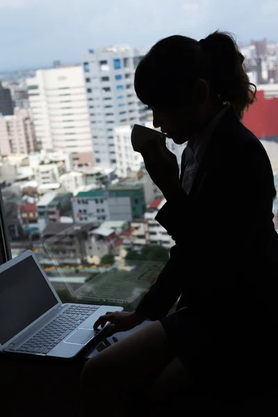 Silhouette of businesswoman work — Stock Photo, Image