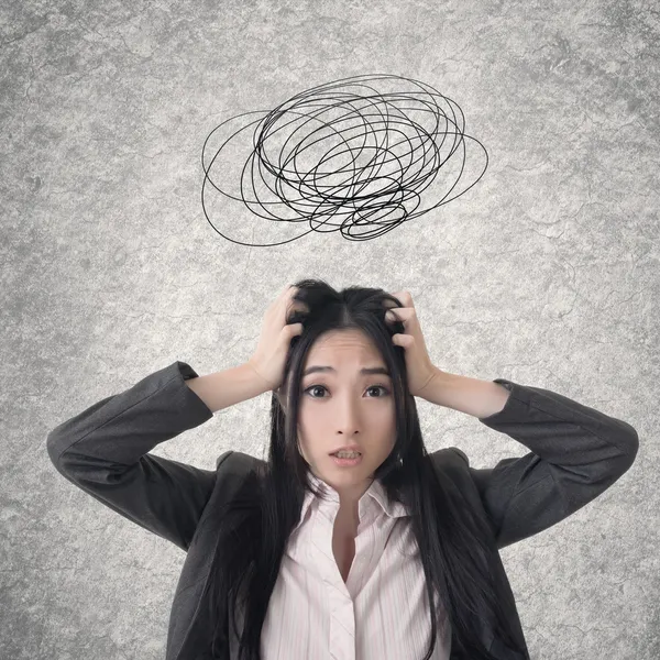Confused Asian business woman — Stock Photo, Image