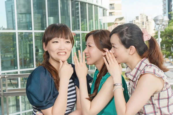 Asian friends' whisper — Stock Photo, Image