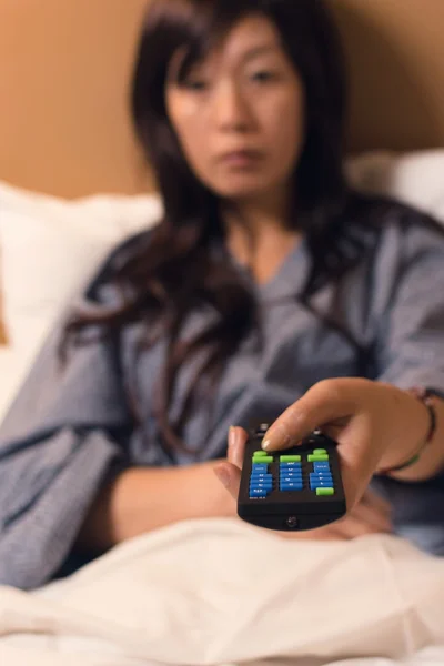 Hold the remote — Stock Photo, Image