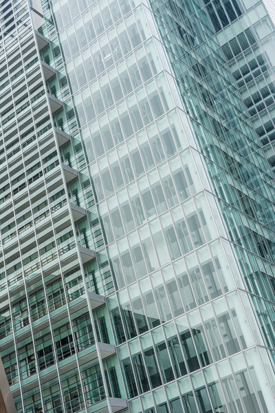 Office glass windows with beautiful reflection in Osaka, Japan, Asia.