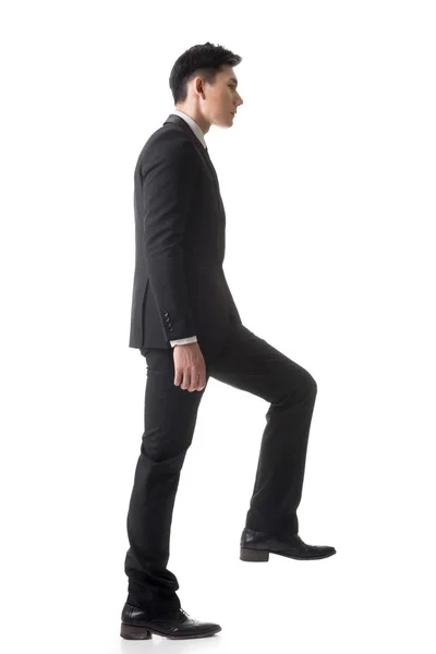 Businessman walking up — Stock Photo, Image