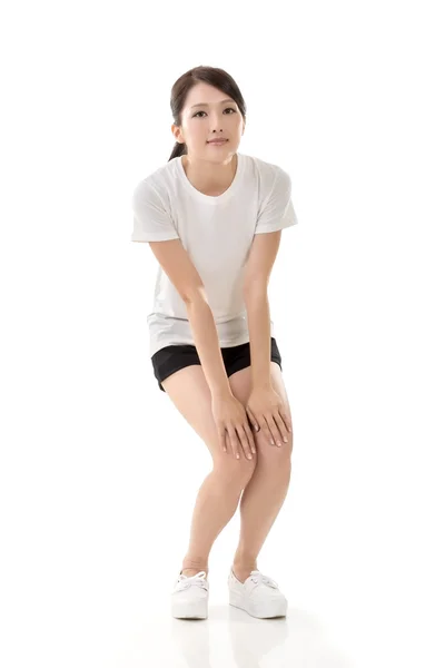 Κορίτσι που κάνει το τέντωμα άσκηση — Φωτογραφία Αρχείου