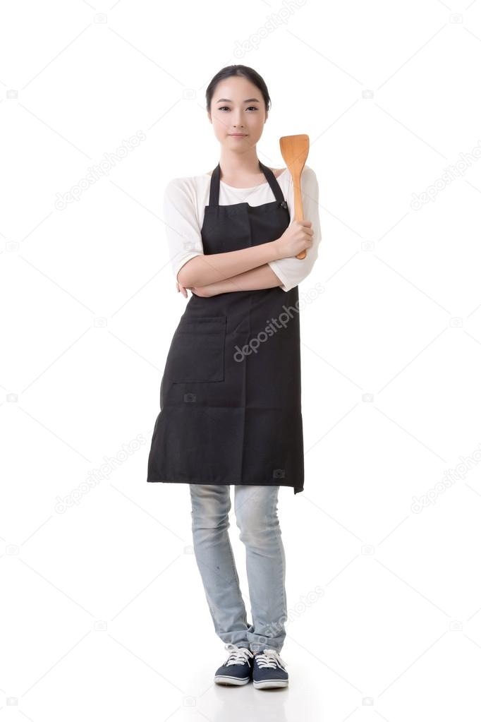 housewife hold a spatula