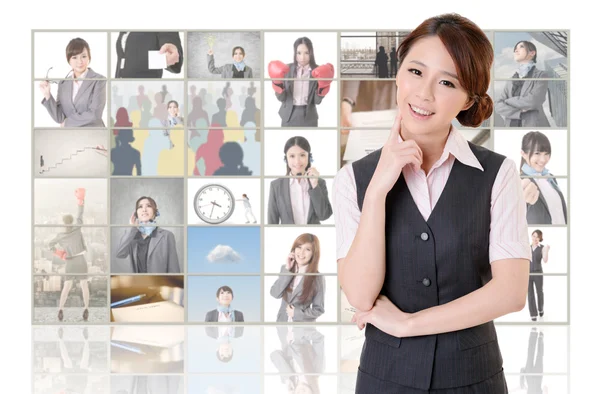 Woman standing in front of TV — Stock Photo, Image