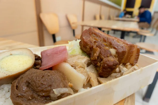 Taiwanese snacks of soy-stewed pork with rice
