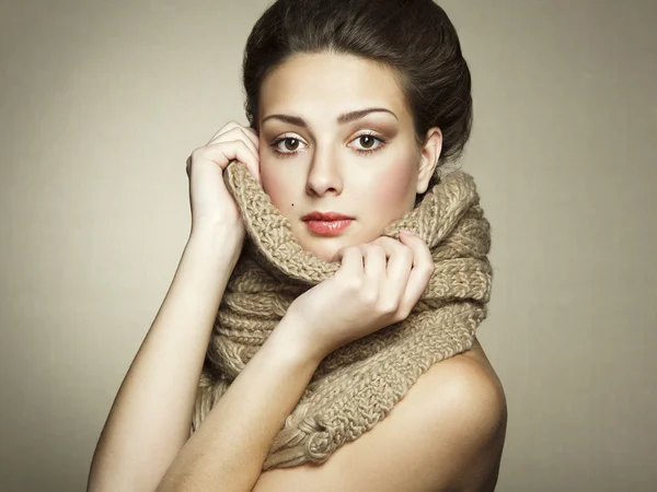 Portrait of a beautiful young woman with scarf — Stock Photo, Image