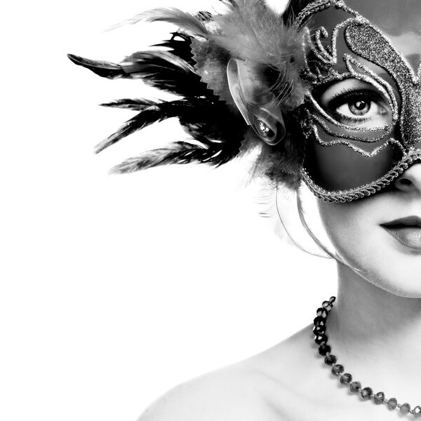 The beautiful young woman in mysterious venetian mask