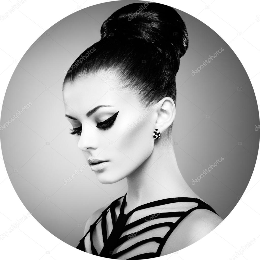 Portrait of beautiful sensual woman with elegant hairstyle. Per