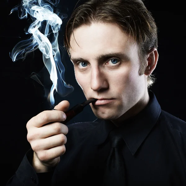 Artistic dark portrait of the young beautiful man. The young man — Stock Photo, Image