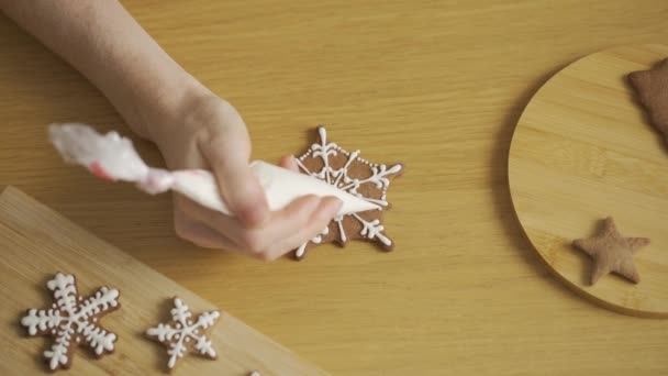 Process Decorating Christmas Cookies Motion Close Woman Decorating Homemade Gingerbread — Stock Video