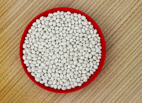 Red beans in a plastic bowl — Stock Photo, Image