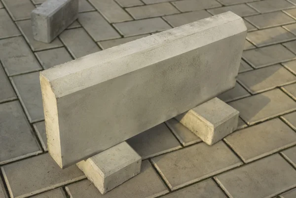 One large curb stone is made of concrete — Stock Photo, Image