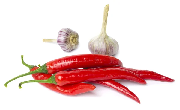 Red pepper and garlic on white — Stock Photo, Image