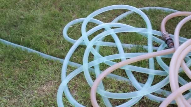 Water movement through garden hose — Stock Video