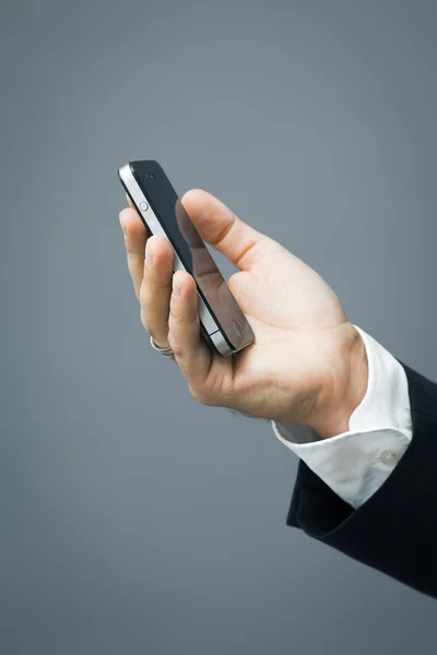 Мобильный телефон для деловых людей — стоковое фото