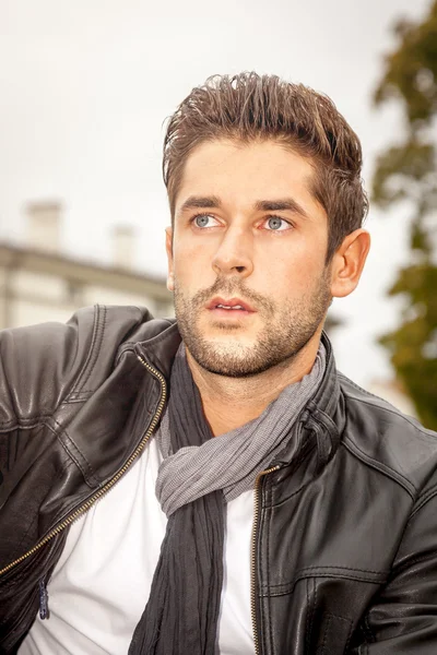 Young man in the autumn — Stock Photo, Image