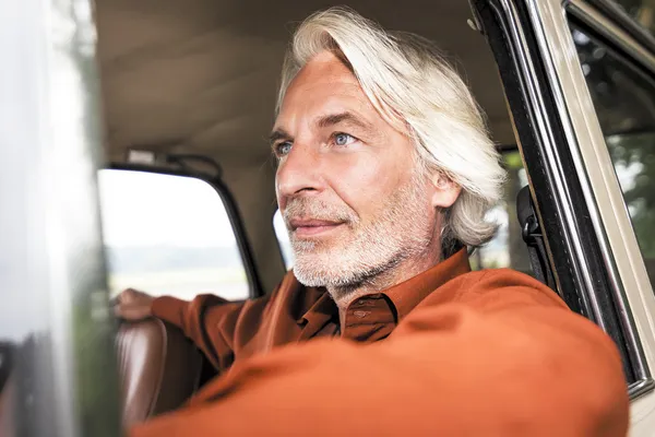 Man in his car — Stock Photo, Image