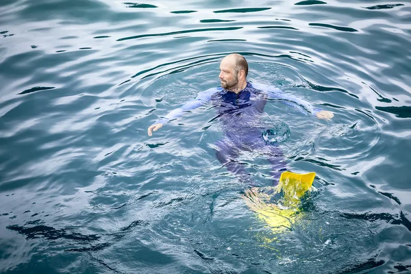 Man in safetysuit — Stock Photo, Image