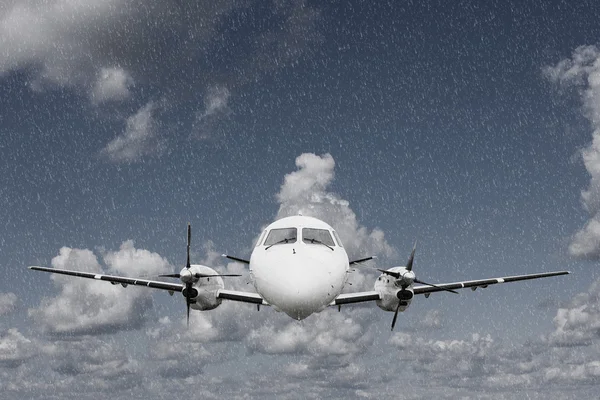 Airplane in the rain — Stock Photo, Image