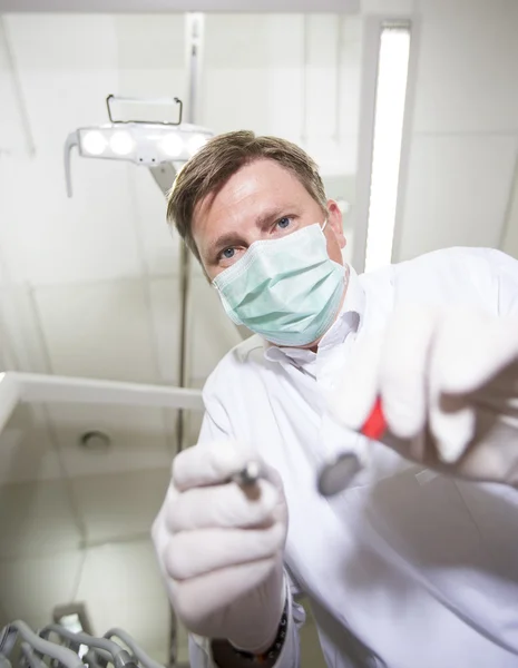 Dentist in action — Stock Photo, Image