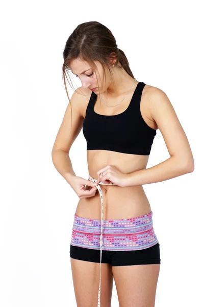 Thin young woman upset over measurements — Stock Photo, Image