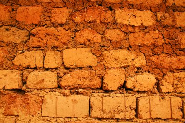 Wall of red earth bricks clipart
