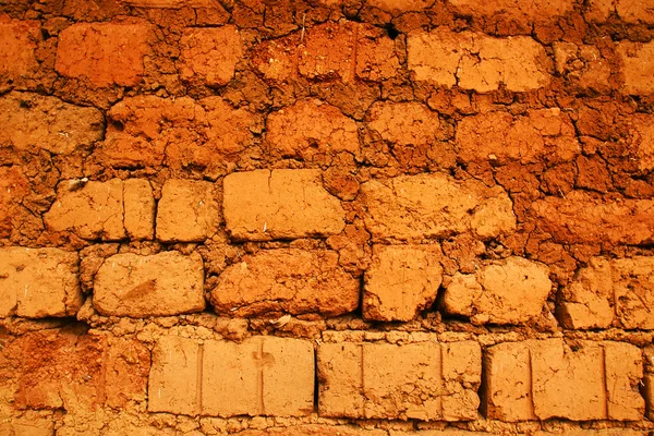 Pared de ladrillos de tierra roja — Foto de Stock