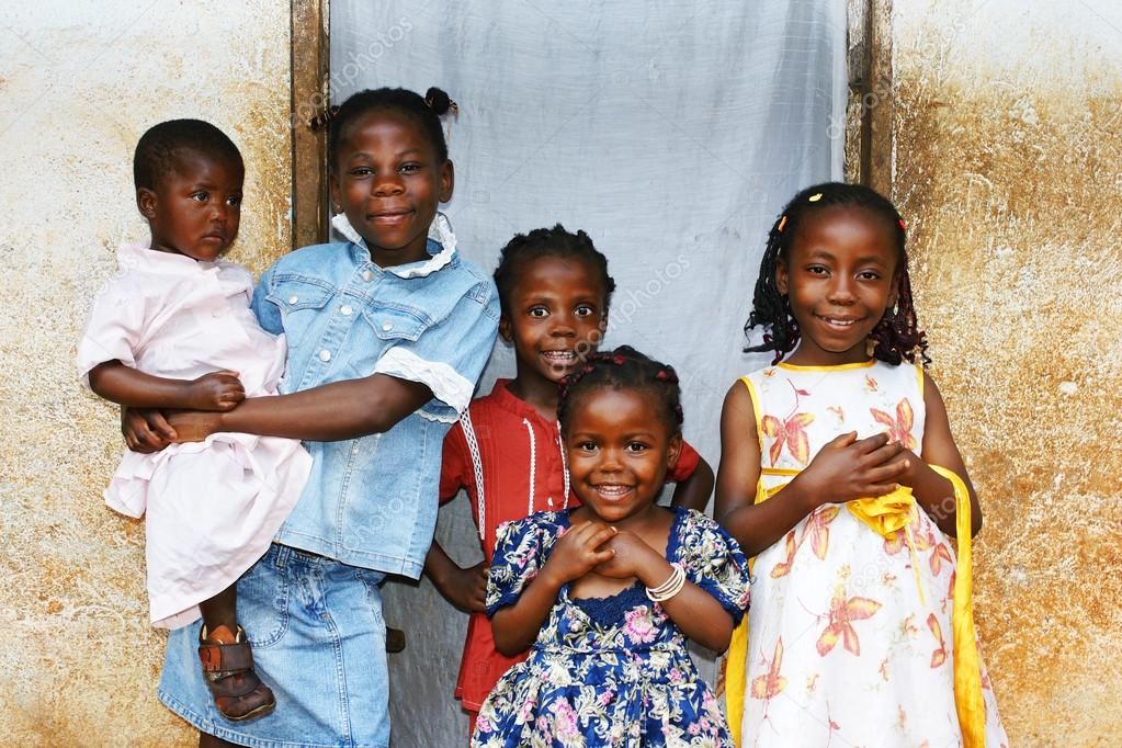 African kids all sisters smiling