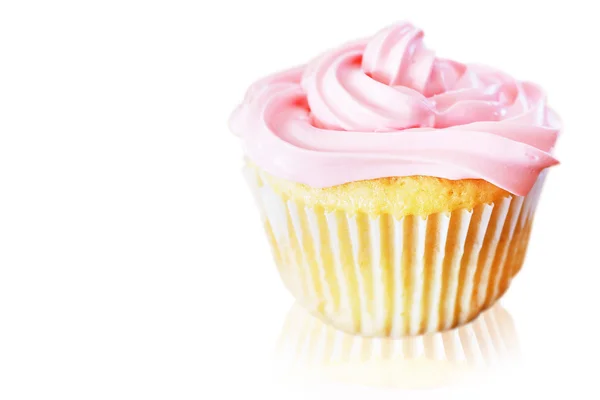 Vanilla cupcake with pink frosting — Stock Photo, Image