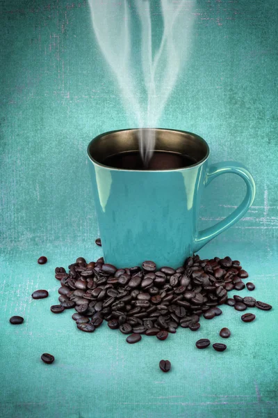 Grungy blue green cup of coffee — Stock Photo, Image