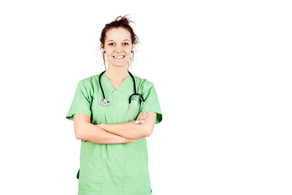 Mujer joven con uniformes verdes sonriendo — Foto de Stock