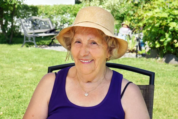 Senior woman with hat — Stock Photo, Image