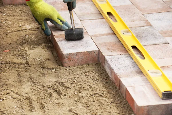 Setting paver — Stock Image Setting paver Stock Photo