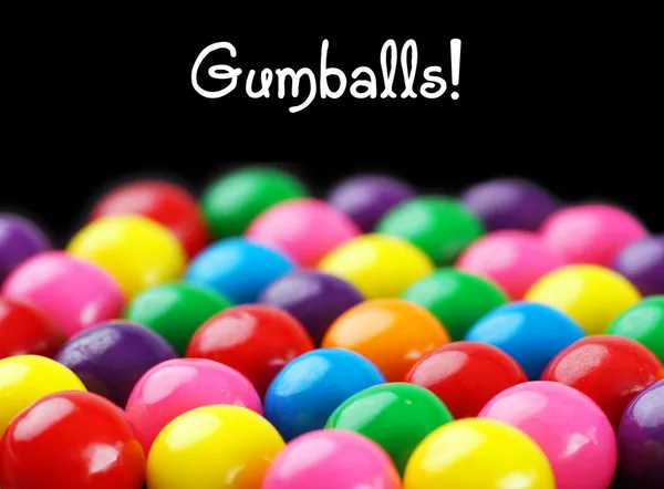 Gumballs på svart — Stockfoto