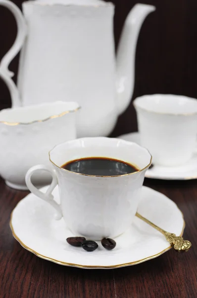 Coffee in white porcelain cup — Stock Photo, Image