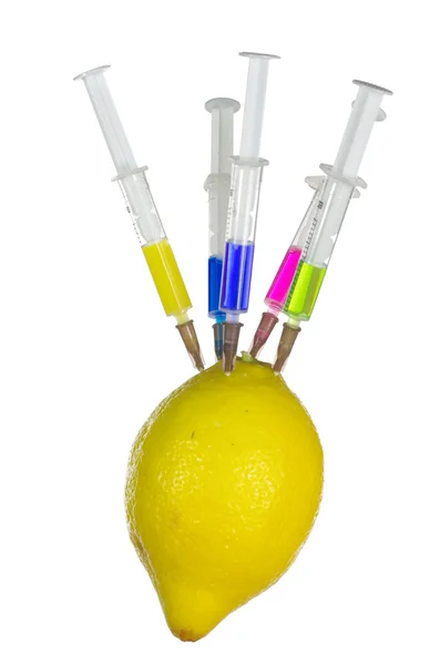 Injection into fresh lemon — Stock Photo, Image