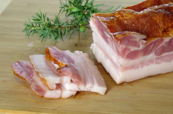 Smoked bacon with juniper — Stock Photo, Image