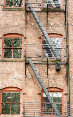 Black Fire Escape on Red Brick Building