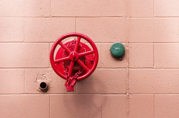 Red Fire Valve and Green Cover — Stock Photo, Image