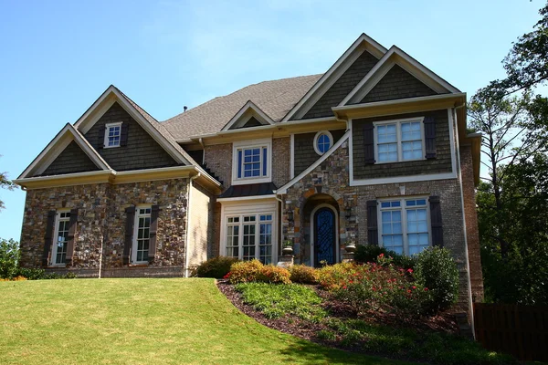 Stone House on Landscaped Hill — Stock Photo, Image