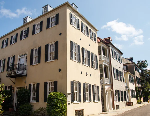 Old Stucco Building with Black Shutters — Stock Photo, Image