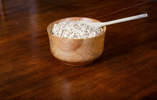 Bowl of Dry Oatmeal with Spoon — Stock Photo, Image