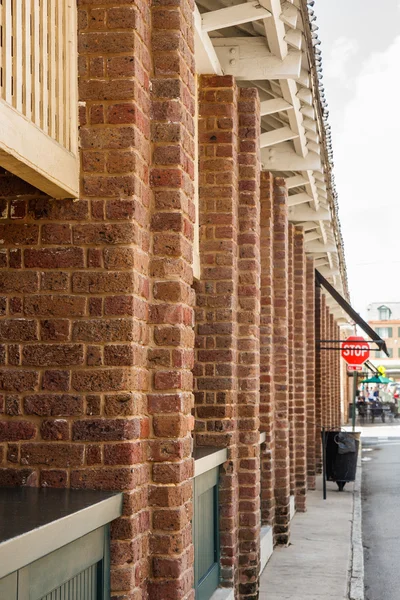 Line of Brick Columns Toward Stop Sign — Stock Photo, Image