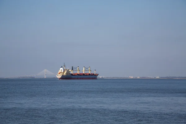 Distant Dredging Ship by Bridge — Stock Photo, Image
