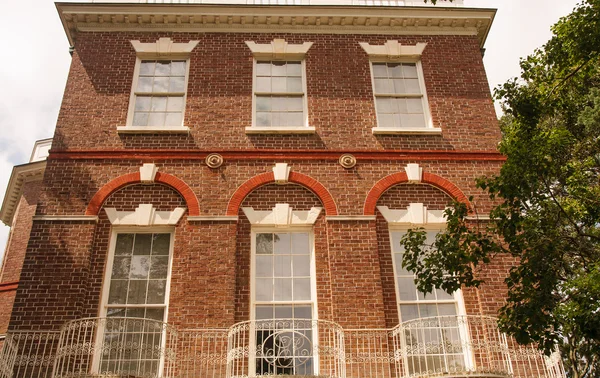 Brick Two Story with White Iron Railings — Stock Photo, Image