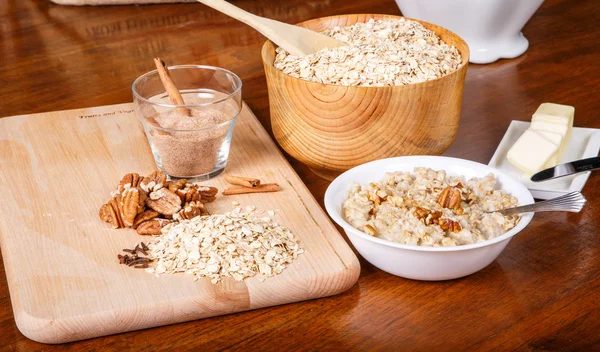 Oatmeal with Nuts Cinnamon and Butter — Stock Photo, Image